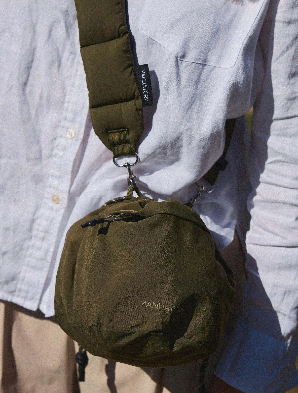 The Capsule Bucket Crossbody Bag — Fatigue